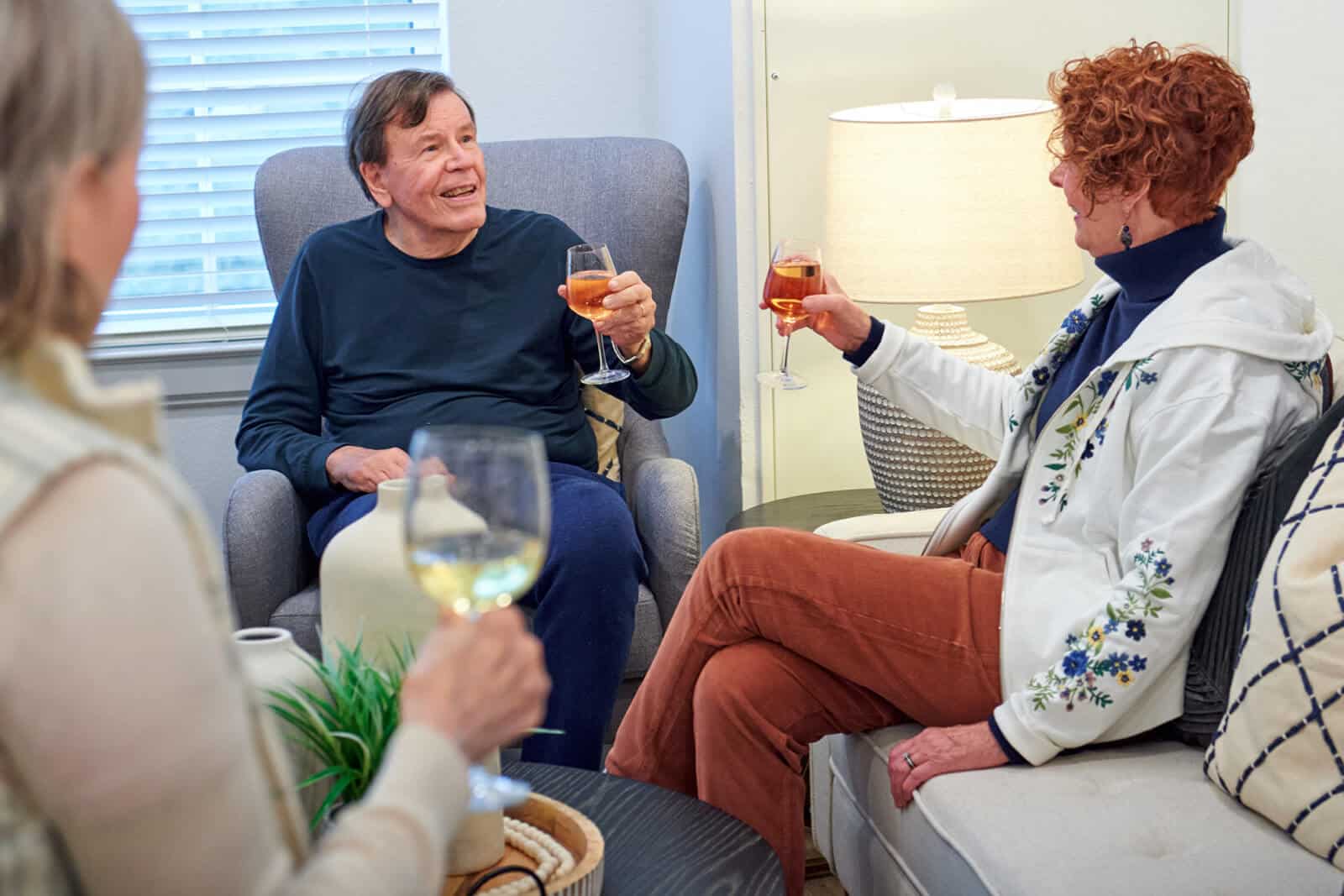 Residents enjoying good conversation and wine