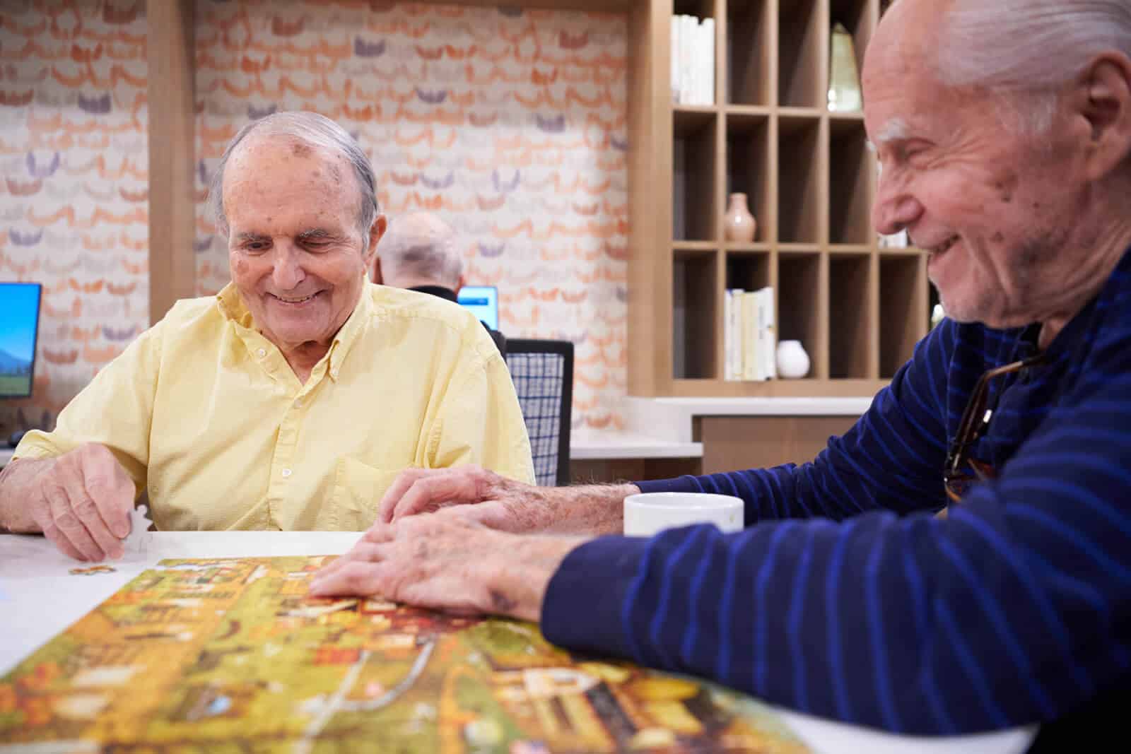 residents putting together a puzzle