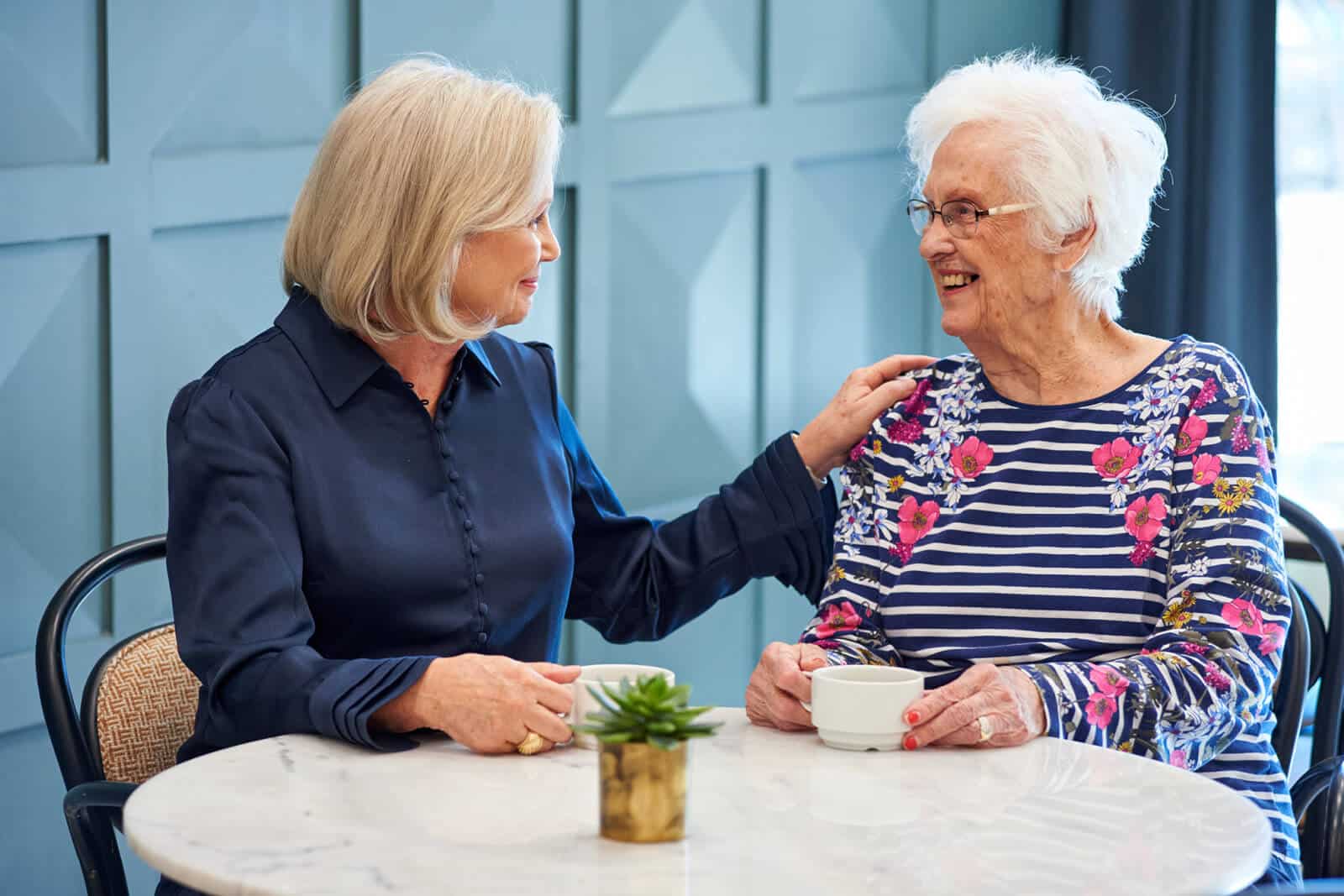 people enjoying coffee and conversation