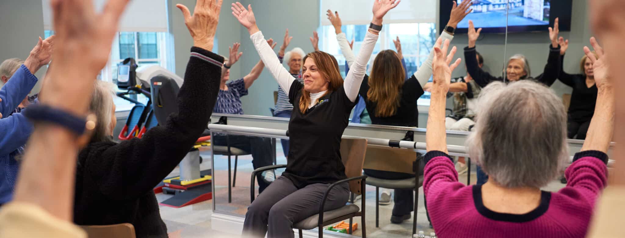 residents doing chair exercises