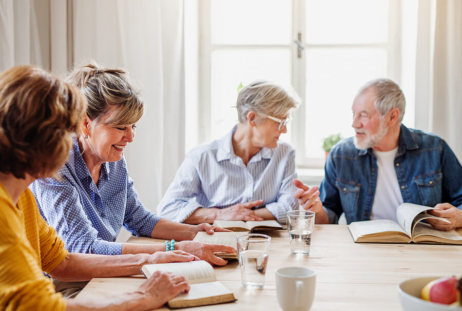 A group of seniors participating in book club